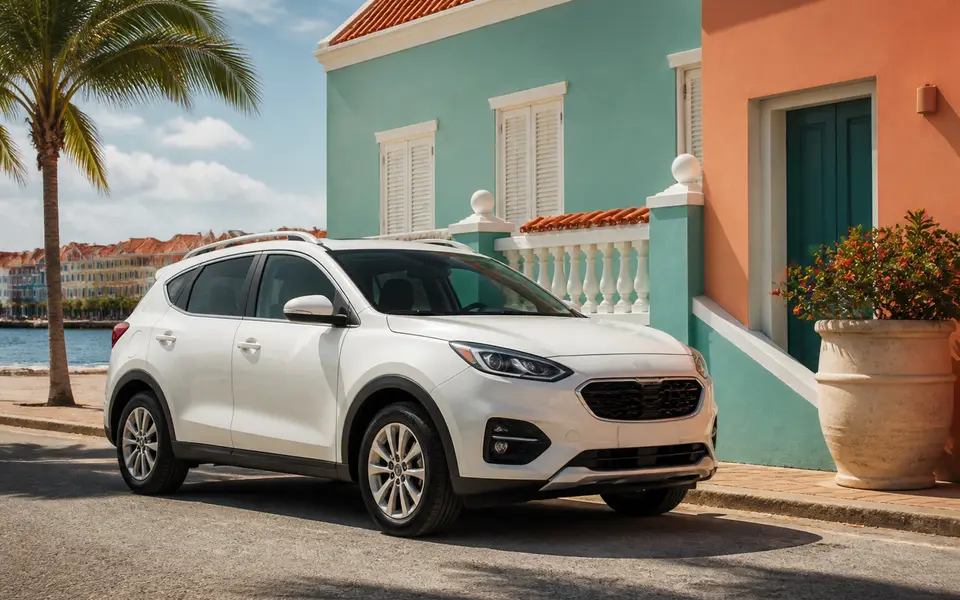 A bright island street with a car ready for the day.
